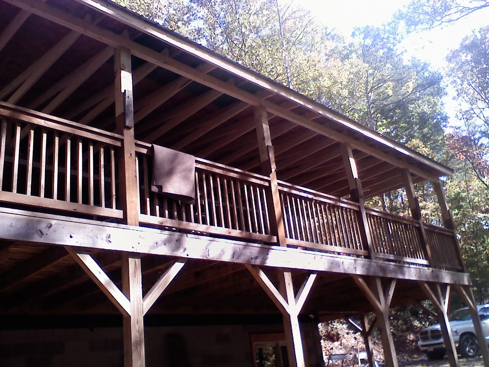 Timber framing under a new elevated porch and deck — Roof Leak Repair in Conetoe by Roofing Brothers